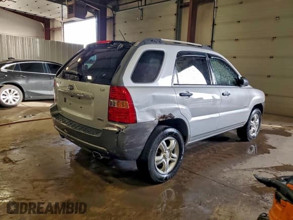 ✅ 2007 Kia Sportage LX • VIN: KNDJE723977447370 • Lot: 93623945. Wystawiony na Copart z przebiegiem 183 828 mil. Bezpłatny archiwum sprzedaży aukcyjnych z USA i szczegółowy raport historii pojazdu na DreamBid. Zdjęcie 3.