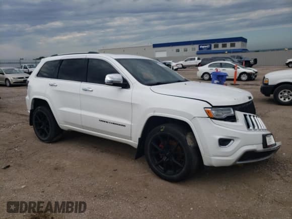 ✅ 2015 Jeep Grand Cherokee Overland • VIN: 1C4RJFCG6FC136074 • Lot: 47198485. Listed on Copart with 142,254 mi. Free auction sales archive from the USA and detailed vehicle history report at DreamBid. Image 4.