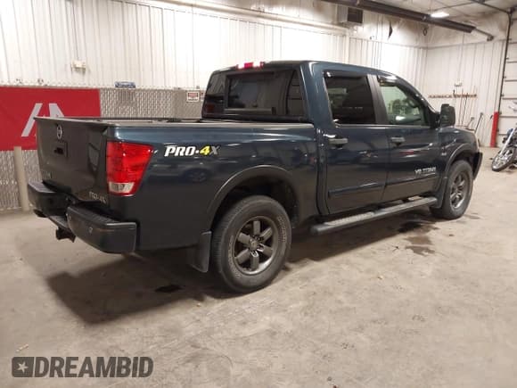 ✅ 2015 Nissan Titan SV • VIN: 1N6AA0ECXFN507338 • Lot: 43703382. Listed on IAAI with 176,222 mi. Free auction sales archive from the USA and detailed vehicle history report at DreamBid. Image 4.