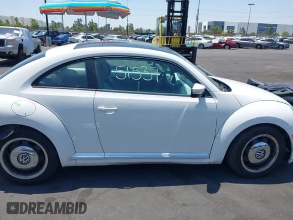 ✅ 2013 Volkswagen Beetle Fender Edition • VIN: 3VWJP7AT0DM619196 • Lot: 42451537. Listed on IAAI with 159,206 mi. Free auction sales archive from the USA and detailed vehicle history report at DreamBid. Image 14.