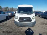 ✅ 2015 Ford Transit Cargo • VIN: 1FTNE2CM5FKA64176 • Lot: 43749103. Listed on IAAI with 344,489 mi. Free auction sales archive from the USA and detailed vehicle history report at DreamBid. Image 12.