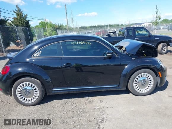 ✅ 2016 Volkswagen Beetle SE • VIN: 3VWJ17AT9GM620367 • Lot: 42198976. Wystawiony na IAAI z przebiegiem 94 048 mil. Bezpłatny archiwum sprzedaży aukcyjnych z USA i szczegółowy raport historii pojazdu na DreamBid. Zdjęcie 13.