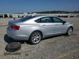 2018 Chevrolet Impala Premier z VIN 2G1125S39J9120107, wystawiony jako Copart lot #81928785 z przebiegiem 60 870 mil mil oraz Szkoda całkowita • Salvage title. Historia ofert i sprzedaży dostępna na DreamBid. Obrazek 3.