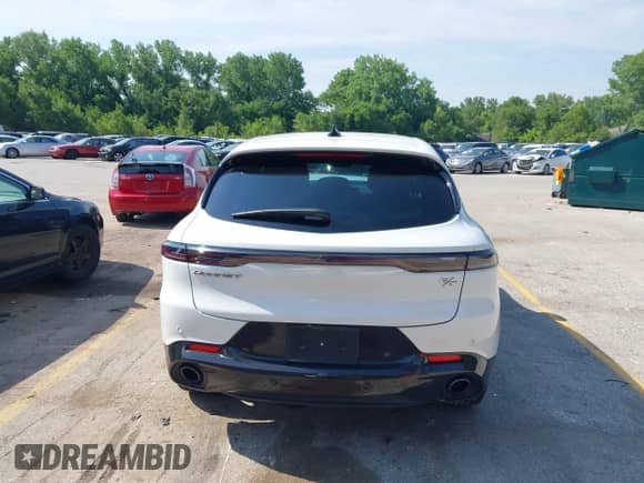 2024 Dodge Hornet R/T z VIN ZACPDFCW2R3A28421, wystawiony jako IAAI lot #42465763 z przebiegiem 34 761 mil mil oraz . Historia ofert i sprzedaży dostępna na DreamBid. Obrazek 16.