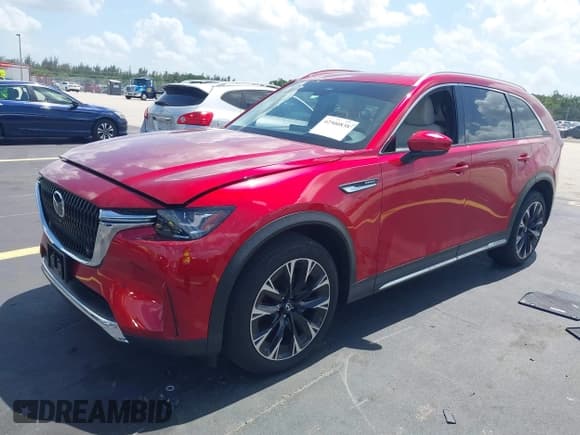 ✅ 2025 Mazda CX-90 Premium Plus Package • VIN: JM3KKEHA9S1227656 • Лот: 42500838. Опубликован ранее на IAAI с пробегом 1 501 миль. Бесплатный доступ к архиву аукционных продаж из США и подробный отчёт об истории автомобиля на DreamBid. Изображение 2.