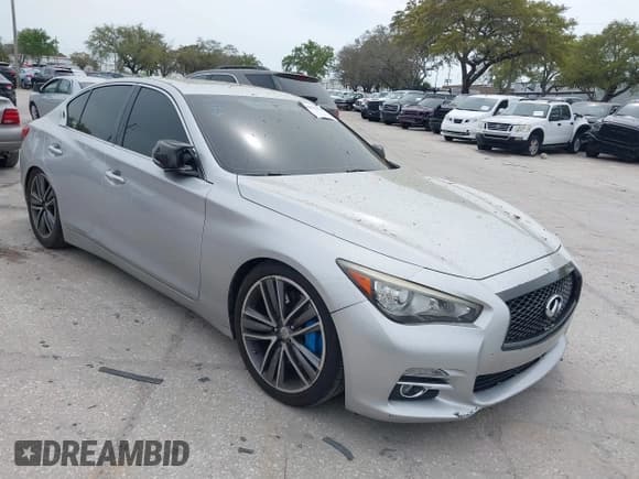 ✅ 2014 Infiniti Q50 Premium • VIN: JN1BV7AP4EM692135 • Lot: 38874654. Listed on IAAI with 104,348 mi. Free auction sales archive from the USA and detailed vehicle history report at DreamBid. Image 1.