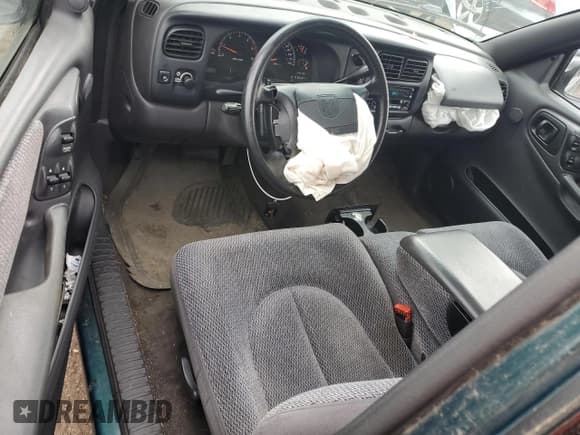 ✅ 1998 Dodge Dakota SLT • VIN: 1B7GL22X1WS754968 • Lot: 49078635. Wystawiony na Copart z przebiegiem 138 116 mil. Bezpłatny archiwum sprzedaży aukcyjnych z USA i szczegółowy raport historii pojazdu na DreamBid. Zdjęcie 8.