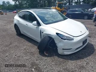 ✅ 2025 Tesla Model Y Long Range • VIN: 7SAYGDEE6SF293100 • Lot: 42599331. Listed on IAAI with 7,872 mi. Free auction sales archive from the USA and detailed vehicle history report at DreamBid. Image 1.