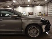 ✅ 2014 Ford Fusion Titanium Hybrid • VIN: 3FA6P0RU1ER217906 • Lot: 42563246. Listed on IAAI with 66,335 mi. Free auction sales archive from the USA and detailed vehicle history report at DreamBid. Image 18.