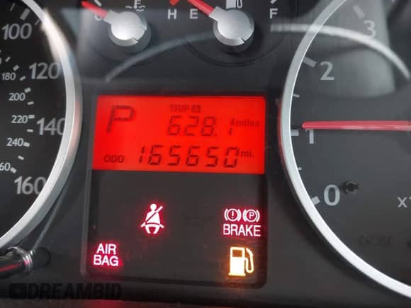 2003 Hyundai Tiburon GT with VIN KMHHN65F53U059705, listed as a IAAI auction lot 43573043 with 165,650 mi miles and . Bid and sale history available at DreamBid. Image 12.