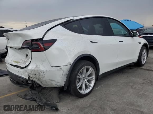 ✅ 2022 Tesla Model Y Long Range • VIN: 7SAYGDEE6NF308568 • Лот: 59603675. Опубликован ранее на Copart с пробегом 35 481 миль. Бесплатный доступ к архиву аукционных продаж из США и подробный отчёт об истории автомобиля на DreamBid. Изображение 3.