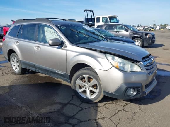 ✅ 2014 Subaru Outback Limited • VIN: 4S4BRBLC7E3325536 • Lot: 41209727. Listed on IAAI with 128,758 mi. Free auction sales archive from the USA and detailed vehicle history report at DreamBid. Image 1.