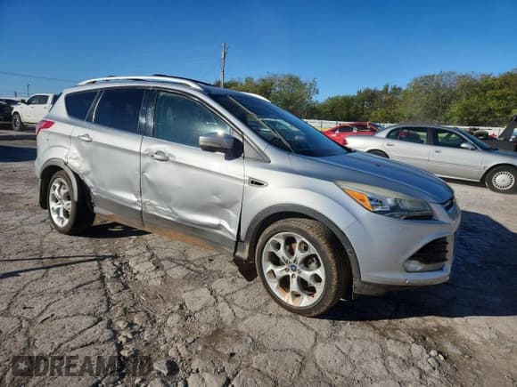 ✅ 2013 Ford Escape Titanium • VIN: 1FMCU0J91DUA59244 • Lot: 90041235. Listed on Copart with 109,309 mi. Free auction sales archive from the USA and detailed vehicle history report at DreamBid. Image 4.