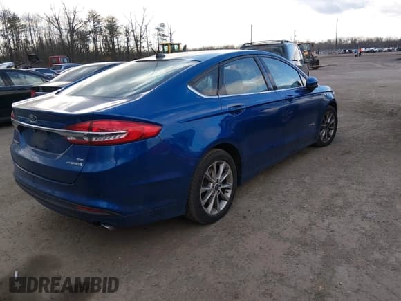 ✅ 2017 Ford Fusion Hybrid SE • VIN: 3FA6P0LU4HR344369 • Lot: 43916879. Listed on IAAI with 162,306 mi. Free auction sales archive from the USA and detailed vehicle history report at DreamBid. Image 4.
