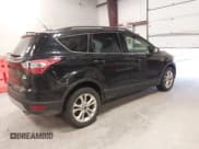 ✅ 2017 Ford Escape SE • VIN: 1FMCU0GD7HUD05182 • Lot: 43727068. Listed on IAAI with 166,677 mi. Free auction sales archive from the USA and detailed vehicle history report at DreamBid. Image 4.