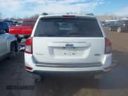 ✅ 2014 Jeep Compass High Altitude • VIN: 1C4NJCEAXED889721 • Лот: 41452426. Опубликован ранее на IAAI с пробегом 94 573 миль. Бесплатный доступ к архиву аукционных продаж из США и подробный отчёт об истории автомобиля на DreamBid. Изображение 17.