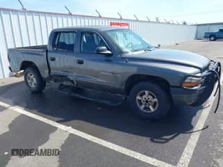 ✅ 2002 Dodge Dakota Sport • VIN: 1B7HL38X42S661356 • Lot: 42451112. Wystawiony na IAAI z przebiegiem Nie podano. Bezpłatny archiwum sprzedaży aukcyjnych z USA i szczegółowy raport historii pojazdu na DreamBid. Zdjęcie 1.