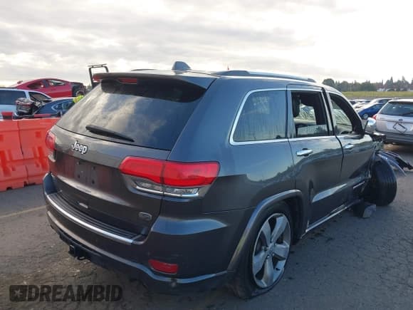 ✅ 2015 Jeep Grand Cherokee Overland • VIN: 1C4RJFCG3FC697994 • Lot: 40526924. Listed on IAAI with 199,275 mi. Free auction sales archive from the USA and detailed vehicle history report at DreamBid. Image 4.