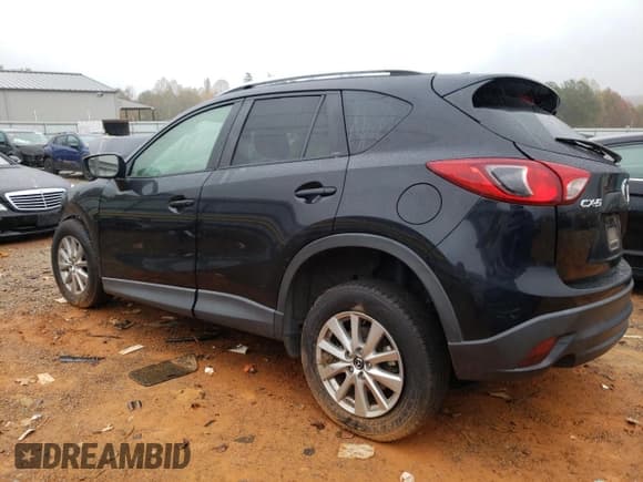 ✅ 2016 Mazda CX-5 Touring • VIN: JM3KE2CY3G0876747 • Lot: 90040135. Listed on Copart with 99,927 mi. Free auction sales archive from the USA and detailed vehicle history report at DreamBid. Image 2.