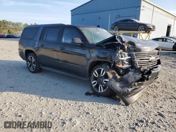 2018 Chevrolet Suburban LT с VIN 1GNSKHKC7JR266242, выставлен на аукционе Copart как лот 71378904 с пробегом 129 349 миль миль и Списание • Salvage title. История ставок и продаж доступна на DreamBid. Изображение 4.