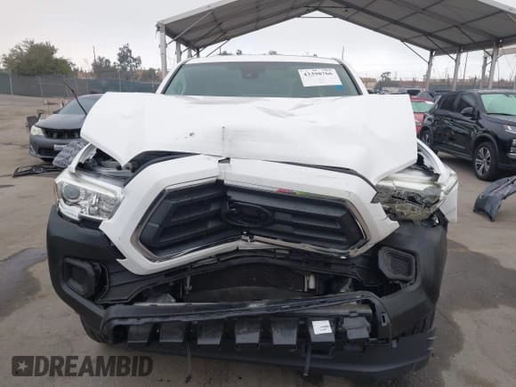 ✅ 2021 Toyota Tacoma SR • VIN: 3TYRX5GN5MT006336 • Лот: 43398766. Опубликован ранее на IAAI с пробегом 86 527 миль. Бесплатный доступ к архиву аукционных продаж из США и подробный отчёт об истории автомобиля на DreamBid. Изображение 12.