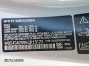 ✅ 2024 BMW M4 Competition xDrive • VIN: WBS43AZ09RCP15123 • Lot: 46450045. Listed on Copart with 16,710 mi. Free auction sales archive from the USA and detailed vehicle history report at DreamBid. Image 14.