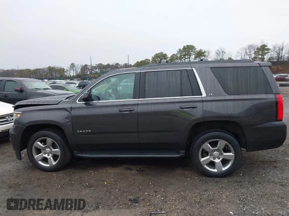 ✅ 2018 Chevrolet Tahoe LT • VIN: 1GNSKBKC1JR377785 • Lot: 41950896. Listed on IAAI with 102,204 mi. Free auction sales archive from the USA and detailed vehicle history report at DreamBid. Image 14.