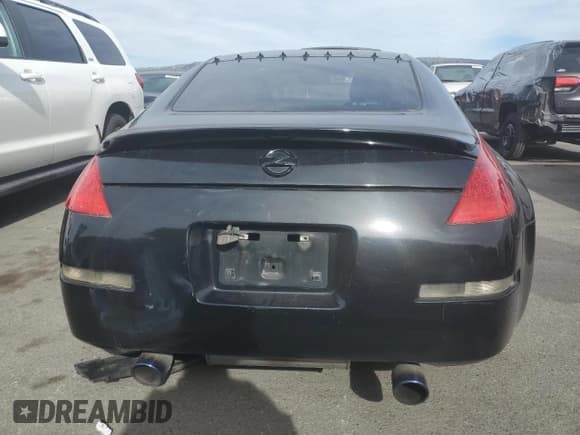 ✅ 2006 Nissan 350Z Enthusiast • VIN: JN1AZ34D66M300770 • Лот: 46680125. Опубликован ранее на Copart с пробегом 128 051 миль. Бесплатный доступ к архиву аукционных продаж из США и подробный отчёт об истории автомобиля на DreamBid. Изображение 6.