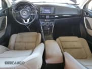 ✅ 2013 Mazda CX-5 Touring • VIN: JM3KE4CE8D0149021 • Lot: 87278475. Listed on Copart with 153,326 mi. Free auction sales archive from the USA and detailed vehicle history report at DreamBid. Image 8.