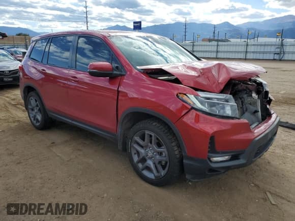 ✅ 2022 Honda Passport EX-L • VIN: 5FNYF8H59NB029196 • Lot: 84275115. Listed on Copart with 72,739 mi. Free auction sales archive from the USA and detailed vehicle history report at DreamBid. Image 4.