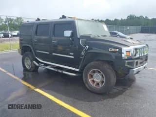 ✅ 2003 Hummer H2 • VIN: 5GRGN23U03H126860 • Лот: 42906502. Опубликован ранее на IAAI с пробегом Не указан. Бесплатный доступ к архиву аукционных продаж из США и подробный отчёт об истории автомобиля на DreamBid. Изображение 1.