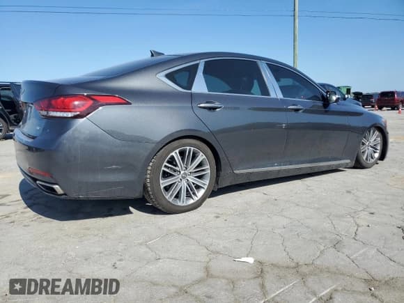 ✅ 2018 Genesis G80 3.8L • VIN: KMHGN4JE9JU245502 • Лот: 54018925. Опубликован ранее на Copart с пробегом 93 829 миль. Бесплатный доступ к архиву аукционных продаж из США и подробный отчёт об истории автомобиля на DreamBid. Изображение 3.