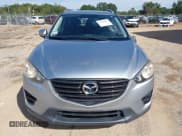 ✅ 2016 Mazda CX-5 Sport • VIN: JM3KE2BY0G0816281 • Lot: 43349897. Listed on IAAI with 73,030 mi. Free auction sales archive from the USA and detailed vehicle history report at DreamBid. Image 12.