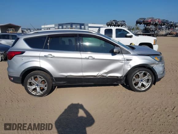 ✅ 2019 Ford Escape Titanium • VIN: 1FMCU0J90KUA50497 • Лот: 43743912. Опубликован ранее на IAAI с пробегом 51 508 миль. Бесплатный доступ к архиву аукционных продаж из США и подробный отчёт об истории автомобиля на DreamBid. Изображение 12.