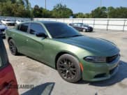 ✅ 2023 Dodge Charger SXT • VIN: 2C3CDXBG3PH674500 • Lot: 69868595. Listed on Copart with 24,205 mi. Free auction sales archive from the USA and detailed vehicle history report at DreamBid. Image 4.