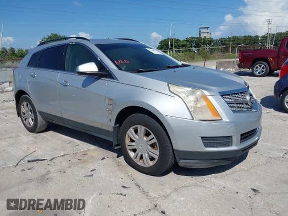 ✅ 2012 Cadillac SRX • VIN: 3GYFNGE39CS555818 • Lot: 42358054. Listed on IAAI with Not provided. Free auction sales archive from the USA and detailed vehicle history report at DreamBid. Image 1.