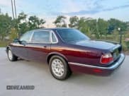 ✅ 2000 Jaguar XJ • VIN: SAJDA23C9YLF18784 • Лот: 91946295. Опубликован ранее на Copart с пробегом 81 605 миль. Бесплатный доступ к архиву аукционных продаж из США и подробный отчёт об истории автомобиля на DreamBid. Изображение 3.