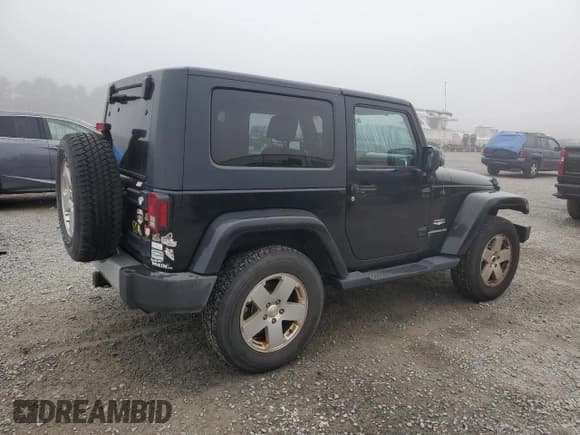 ✅ 2010 Jeep Wrangler Sahara • VIN: 1J4AA5D18AL162356 • Lot: 85100424. Listed on Copart with 205,939 mi. Free auction sales archive from the USA and detailed vehicle history report at DreamBid. Image 3.