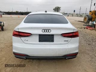 ✅ 2022 Audi A5 Sportback Premium • VIN: WAUABCF50NA014675 • Лот: 92343215. Опубликован ранее на Copart с пробегом 56 454 миль. Бесплатный доступ к архиву аукционных продаж из США и подробный отчёт об истории автомобиля на DreamBid. Изображение 6.