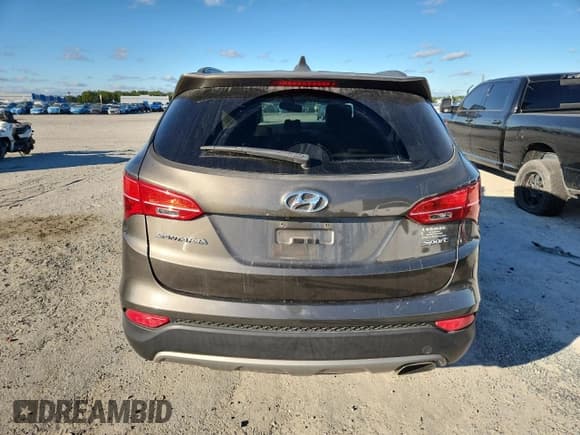 ✅ 2014 Hyundai Santa Fe • VIN: 5XYZU3LB4EG204862 • Лот: 90460955. Опубликован ранее на Copart с пробегом 209 853 миль. Бесплатный доступ к архиву аукционных продаж из США и подробный отчёт об истории автомобиля на DreamBid. Изображение 6.