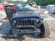 ✅ 2016 Jeep Wrangler Unlimited Sport • VIN: 1C4BJWDG3GL302018 • Lot: 42406265. Listed on IAAI with 180,891 mi. Free auction sales archive from the USA and detailed vehicle history report at DreamBid. Image 13.