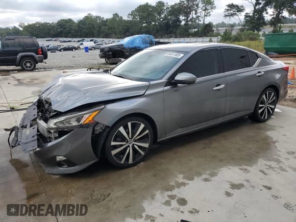 ✅ 2019 Nissan Altima Platinum • VIN: 1N4BL4FV1KC184141 • Лот: 84541805. Опубликован ранее на Copart с пробегом 88 486 миль. Бесплатный доступ к архиву аукционных продаж из США и подробный отчёт об истории автомобиля на DreamBid. Изображение 1.