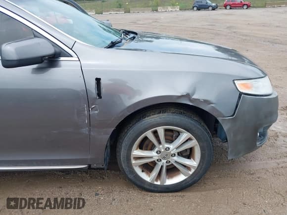 ✅ 2012 Lincoln MKS • VIN: 1LNHL9DR5CG802672 • Lot: 42916085. Wystawiony na IAAI z przebiegiem 188 496 mil. Bezpłatny archiwum sprzedaży aukcyjnych z USA i szczegółowy raport historii pojazdu na DreamBid. Zdjęcie 12.