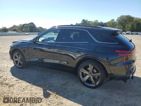✅ 2023 Genesis GV70 2.5T • VIN: KMUMADTB1PU125513 • Lot: 87042335. Listed on Copart with 35,746 mi. Free auction sales archive from the USA and detailed vehicle history report at DreamBid. Image 2.