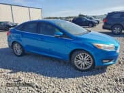 ✅ 2015 Ford Focus Titanium • VIN: 1FADP3J25FL229611 • Lot: 94754285. Listed on Copart with 90,630 mi. Free auction sales archive from the USA and detailed vehicle history report at DreamBid. Image 4.