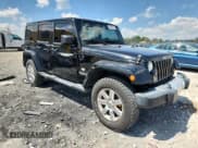 ✅ 2011 Jeep Wrangler Unlimited 70th Anniversary • VIN: 1J4BA7H14BL613844 • Lot: 62983445. Listed on Copart with 143,226 mi. Free auction sales archive from the USA and detailed vehicle history report at DreamBid. Image 4.