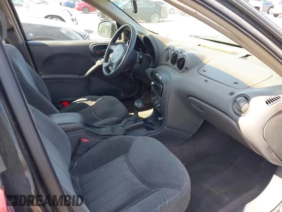 ✅ 1999 Pontiac Grand Am SE2 • VIN: 1G2NE52T0XM702788 • Lot: 42564414. Wystawiony na IAAI z przebiegiem 195 067 mil. Bezpłatny archiwum sprzedaży aukcyjnych z USA i szczegółowy raport historii pojazdu na DreamBid. Zdjęcie 5.