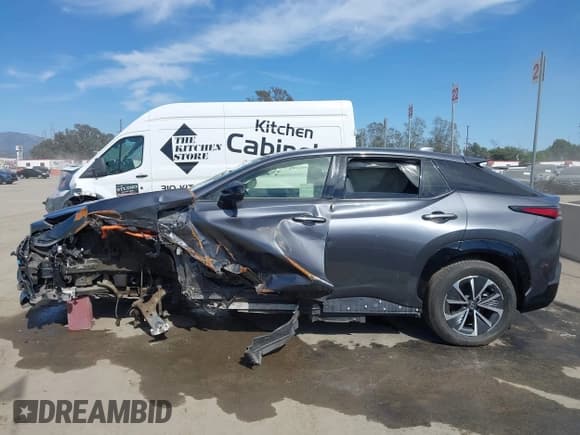 ✅ 2023 Lexus RZ 450e Premium • VIN: JTJAAAAB3PA008294 • Lot: 40802759. Listed on IAAI with 22,431 mi. Free auction sales archive from the USA and detailed vehicle history report at DreamBid. Image 14.