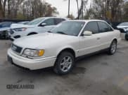 ✅ 1996 Audi A6 • VIN: WAUGA84A6TN084231 • Лот: 40940280. Опубликован ранее на IAAI с пробегом 210 502 миль. Бесплатный доступ к архиву аукционных продаж из США и подробный отчёт об истории автомобиля на DreamBid. Изображение 2.