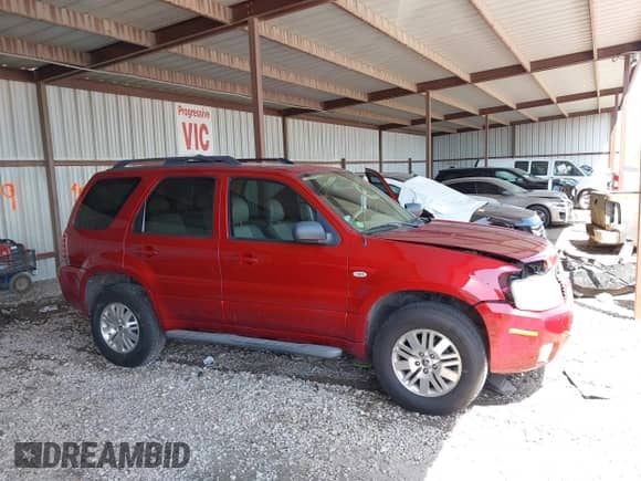 2006 Mercury Mariner Luxury z VIN 4M2YU56186KJ03260, wystawiony jako IAAI lot #42010188 z przebiegiem 103 673 mil mil oraz . Historia ofert i sprzedaży dostępna na DreamBid. Obrazek 13.